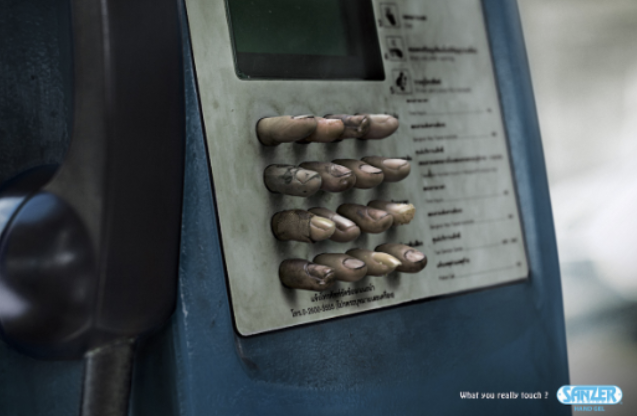 Sanzer Hand Gel print ad visualizing bacteria elimination