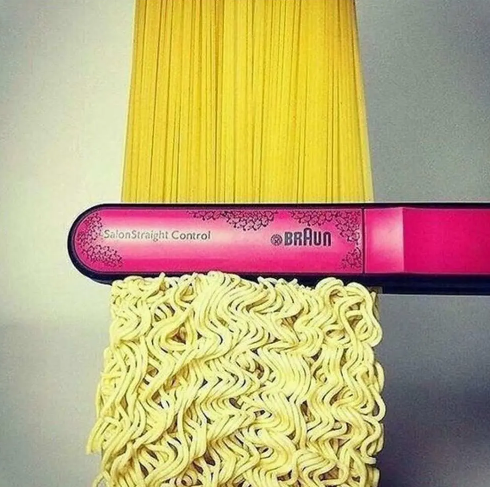 Máy duỗi tóc ép thẳng những sợi mì xoăn. (Nguồn: Penji)